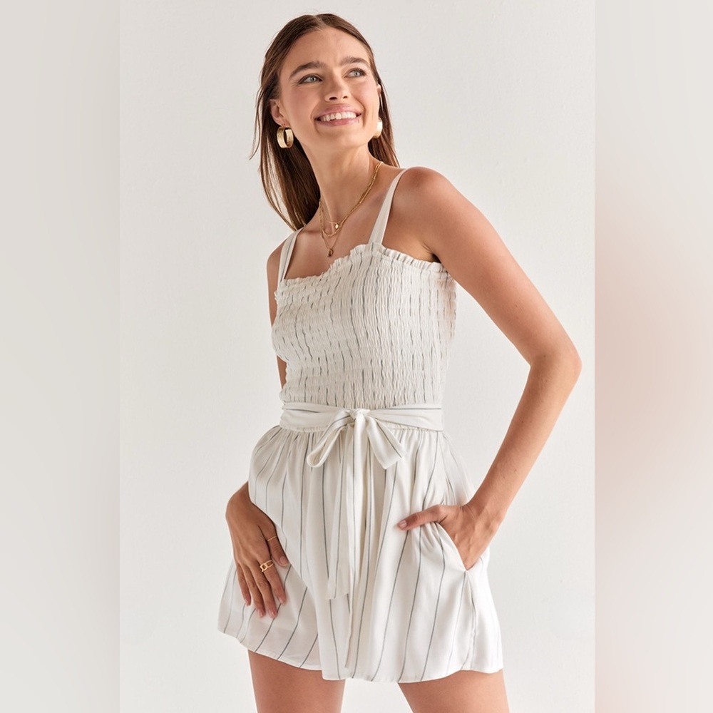 Francesca's Collections White Jumpsuit with Smocked Bodice and Wide-Leg Design